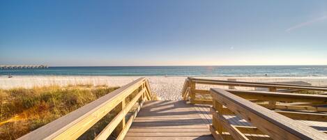 On the beach, sun-loungers