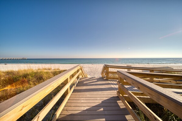 On the beach, sun-loungers