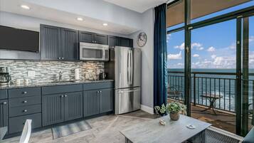 Fridge, microwave, stovetop, coffee/tea maker