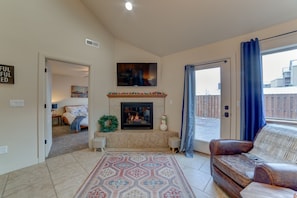 Smart TV, fireplace, books