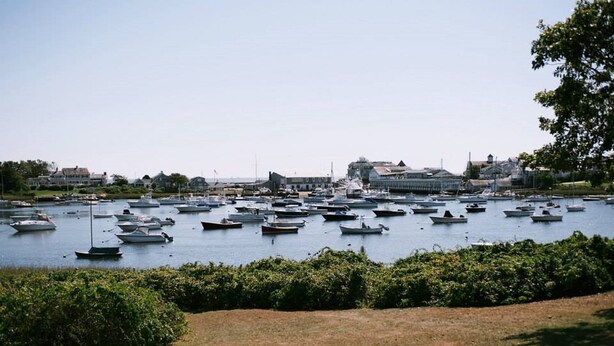 A marina with numerous boats docked. - Walk from your family friendly house to the beach, downtown, or Wychmere Resort (Harwich Port)