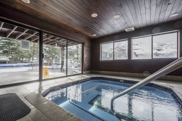Year round indoor and outdoor hot tub