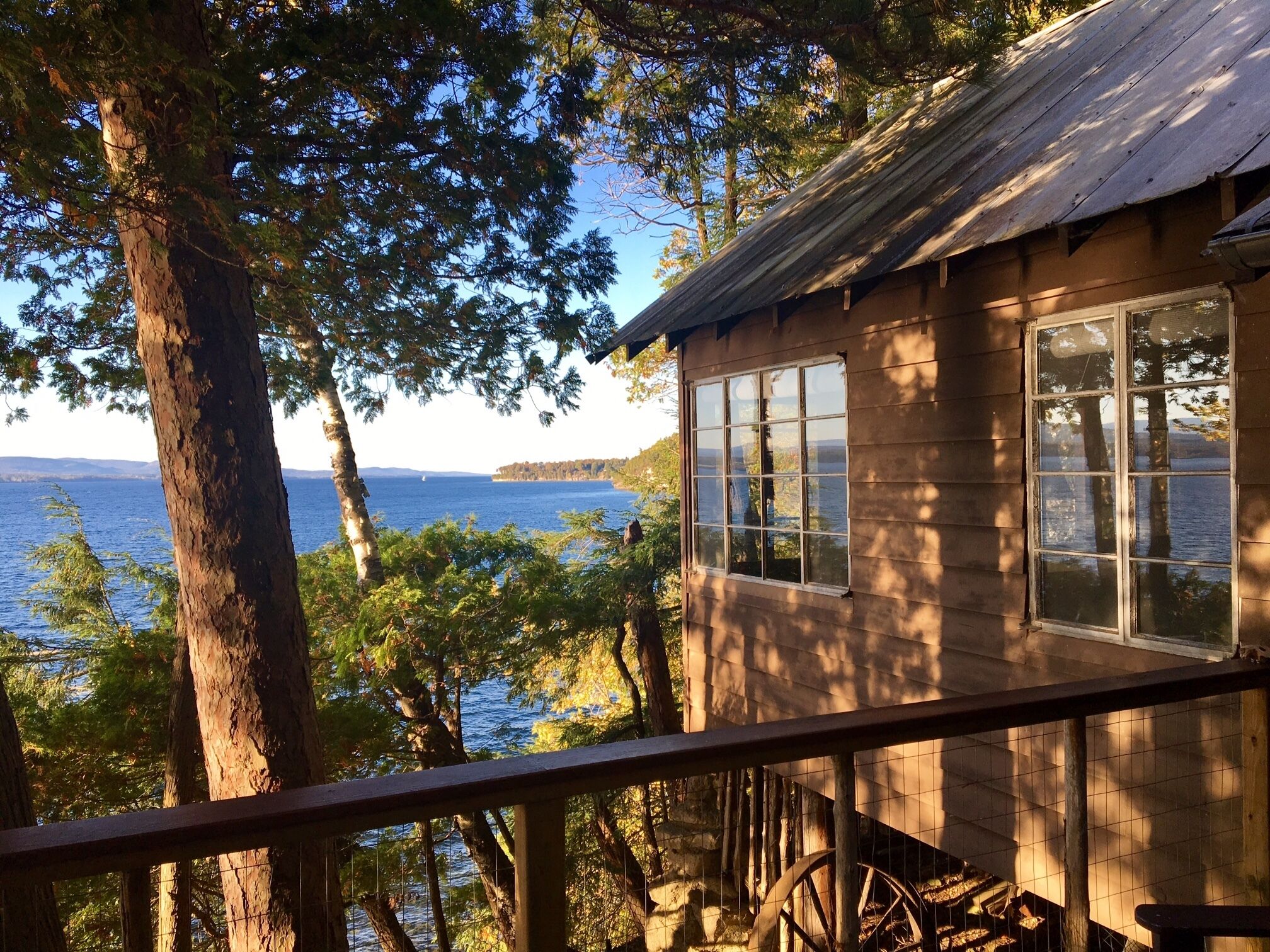 Lake Champlain camp, spacious deck, sunset & mountain views, beach and dock
