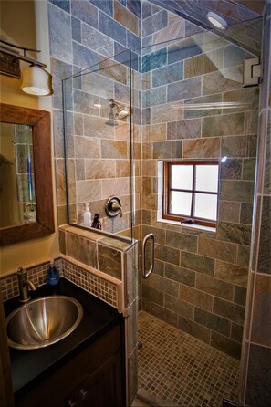 Shower, hair dryer, towels, soap