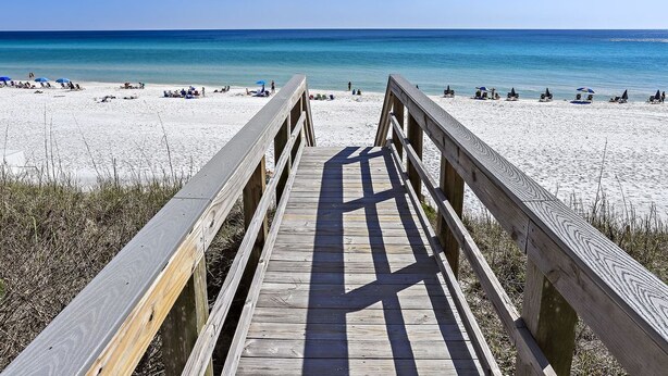 A wooden boardwalk leading to a beach with clear skies. - Gorgeous Overlooking Gulf,Patio, Pool, Grill (Santa Rosa Beach)