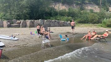 On the beach, sun loungers