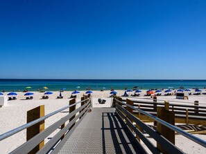 On the beach, sun-loungers