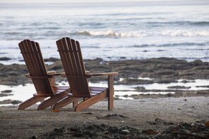 On the beach, sun loungers, beach towels