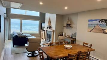 Smart TV, fireplace, DVD player, books