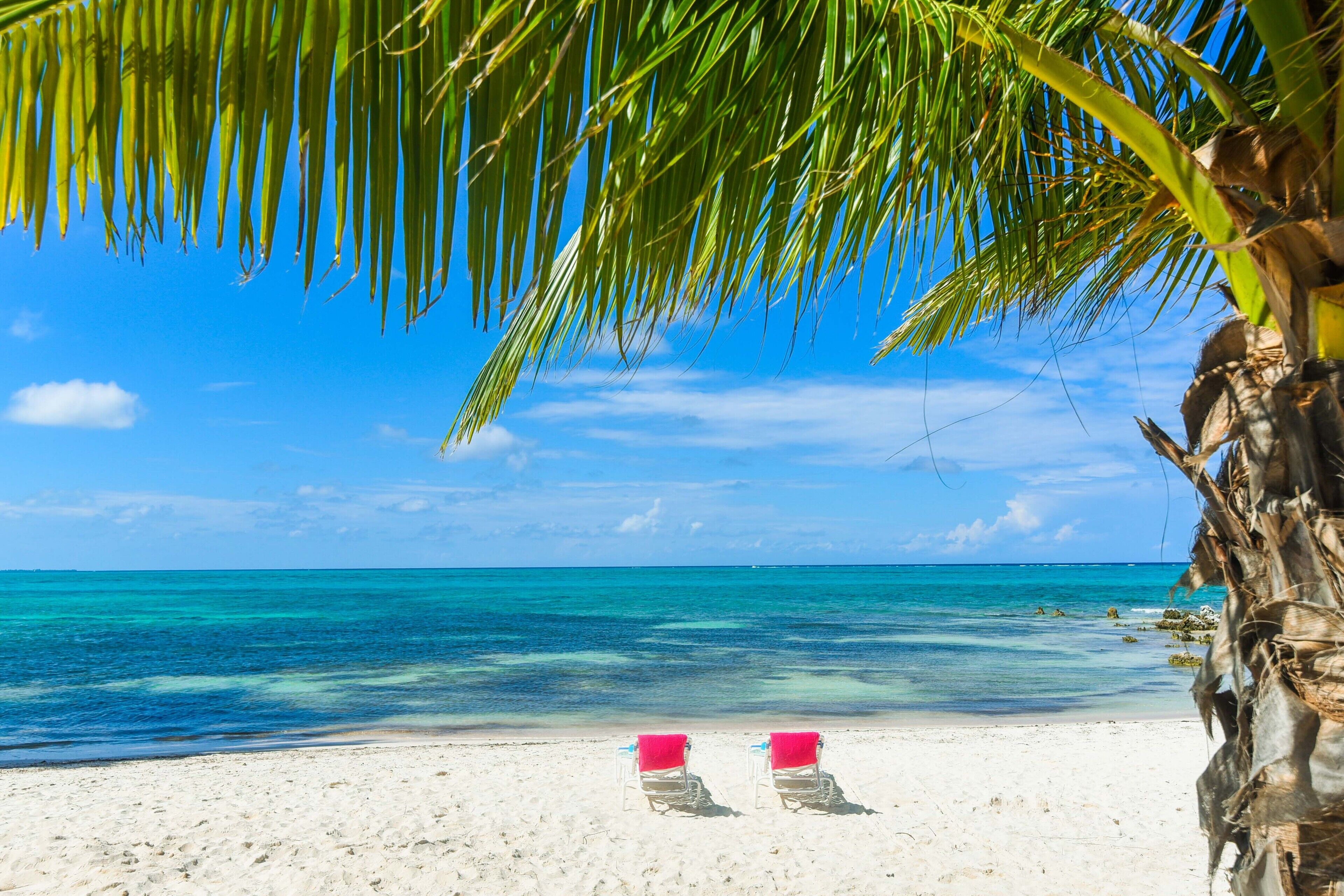 On the beach, sun loungers, beach towels