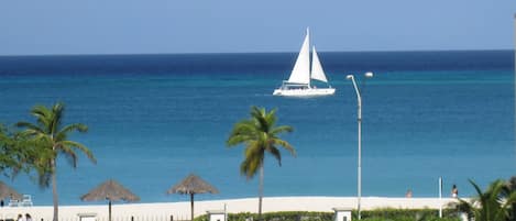 On the beach, sun loungers, beach towels
