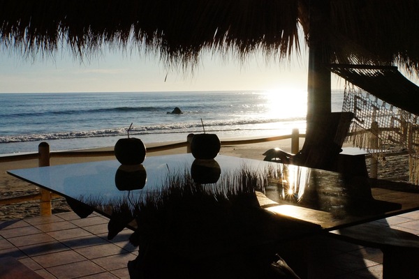 HAVE SOME FRESH COCONUT WATER WHILE ENJOYING THE VIEW