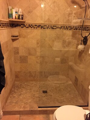Combined shower/tub, hair dryer, towels, soap