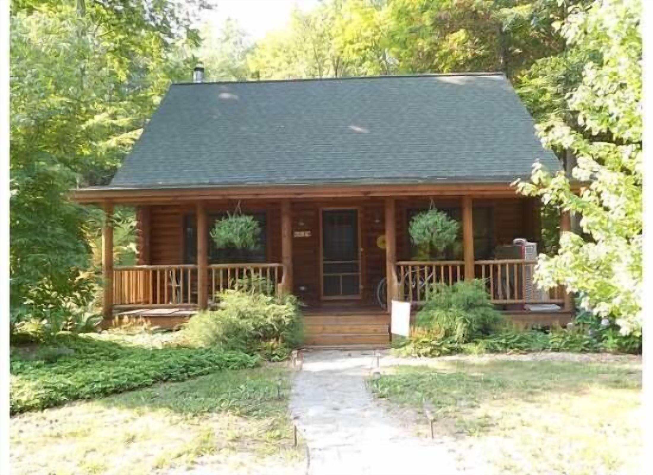 Genuine log cabin in Saugatuck area Goshorn Lake in Hidden Dunes Community