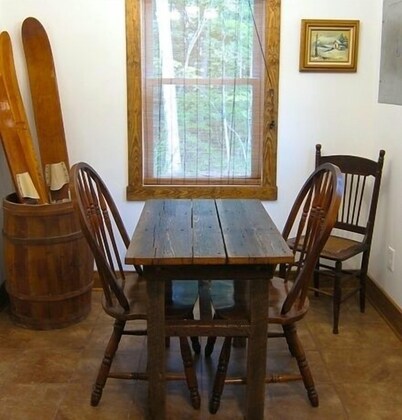 Solar powered cottage at lake, with dock, on private 300 acre timber preserve