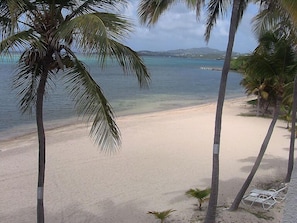 On the beach, sun-loungers, beach towels