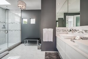 Shower, hair dryer, towels, soap