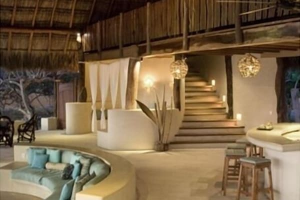 LIVING ROOM, KITCHEN AND STAIRS TO SLEEPING LOFT