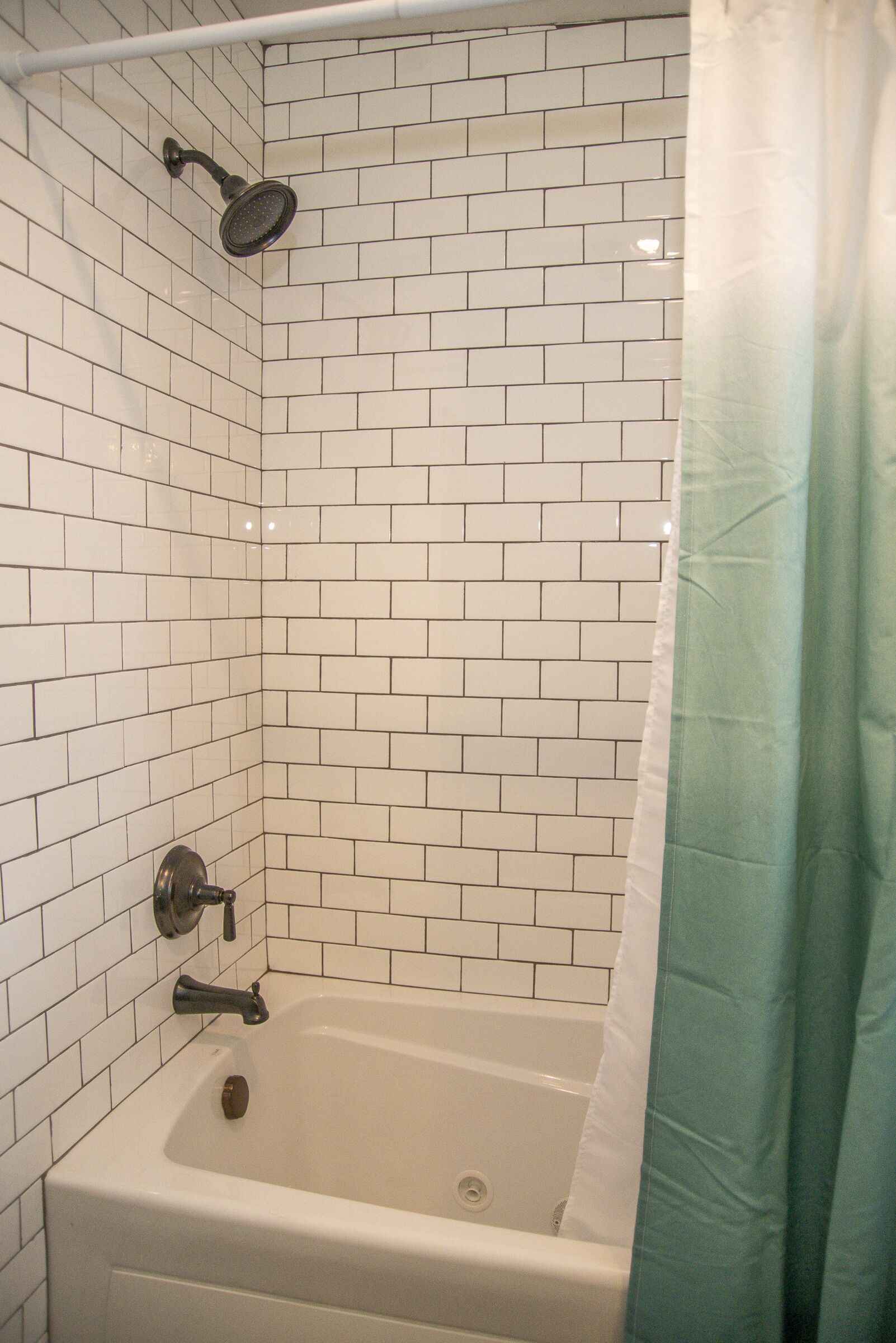 Combined shower/bathtub, hair dryer, towels, soap