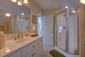 Combined shower/tub, hair dryer, towels, soap
