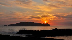 On the beach - 'A House to Live for -View to Die for'. (Dingle)