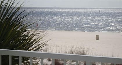 BEACH FRONT CONDO STEPS FROM THE POOL AND BEACH! STARTING AT $189 PER NIGHT.