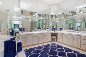Bathtub, jetted bath, hair dryer, towels