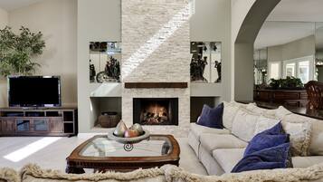 Smart TV, fireplace, table tennis, books