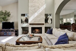 Smart TV, fireplace, table tennis, books