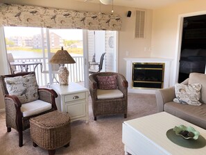 TV, fireplace, books - Pet-Friendly with Stunning Water Views in Bethany Bay - No Cleaning Fees (Ocean View)