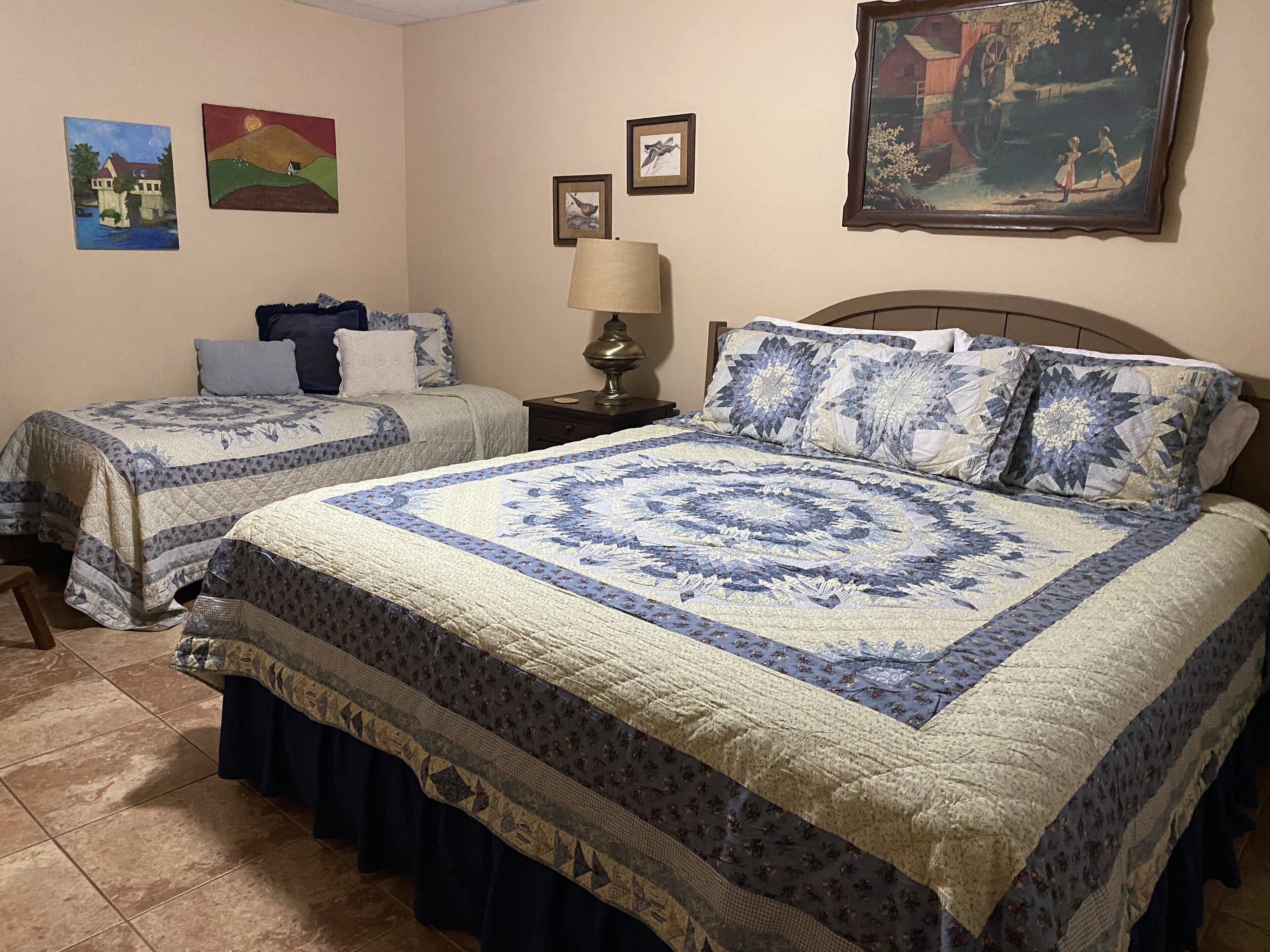 Downstairs king bedroom with twin bed.
