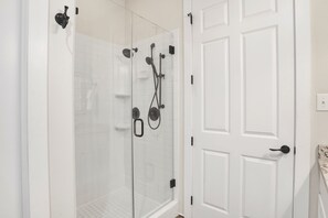 Combined shower/tub, hair dryer, towels, soap
