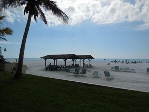 On the beach, sun loungers, beach towels