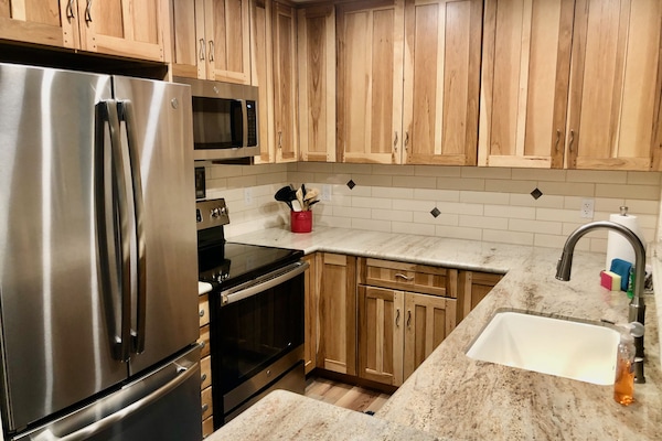 Upgraded Kitchen with granite counters