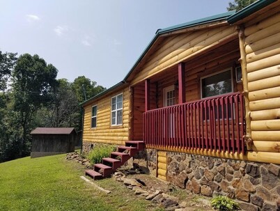 The ranch style sandstone log home 3BR 2BA