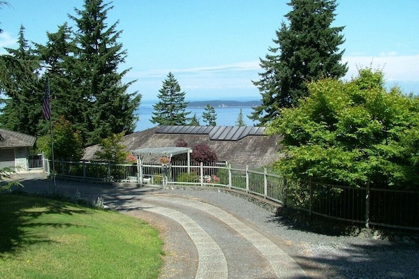 Driveway approach to the main house and guest house, which is on the right.