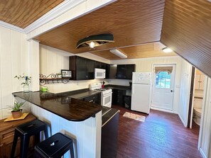 Fridge, microwave, oven, stovetop - Cozy Cabin on Big St Germain Lake sleeps 2
modern appliances, Beach on prop! (St Germain)