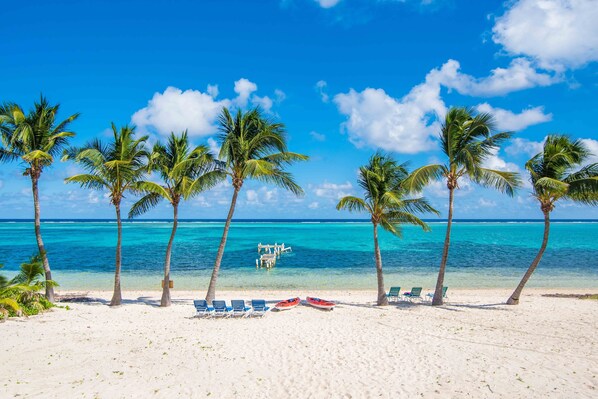 On the beach, sun loungers, beach towels