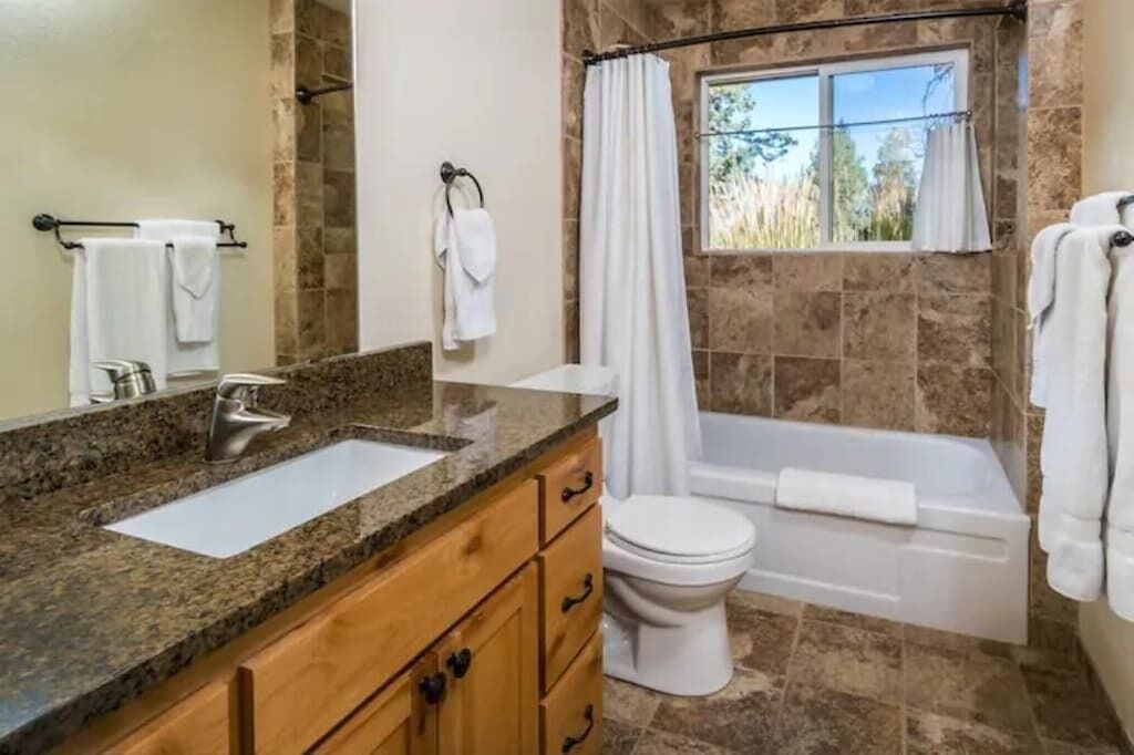 Combined shower/tub, hair dryer, towels, soap