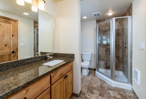 Combined shower/bathtub, hair dryer, towels, soap