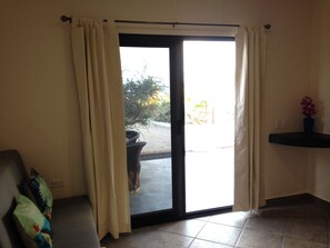 Enjoy the seamless transition from indoors to outdoors through the sliding glass door.
