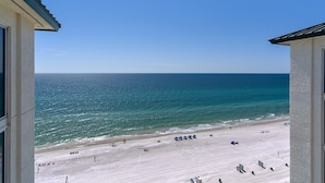 A beach view from a building with a clear sky. - 3 Bdr Penthouse Unit Over the Polynesian Pool!! FREE BEACH CHAIRS!! (Panama City Beach)