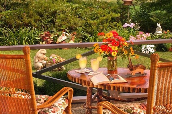 Relax, enjoy the view from this newly.
screened-in, comfy rocking chair porch!