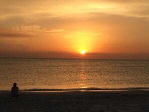 On the beach, sun loungers, beach towels