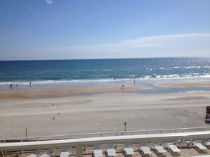 On the beach, sun-loungers, beach towels