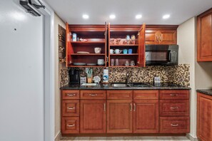 Fridge, microwave, stovetop, coffee/tea maker