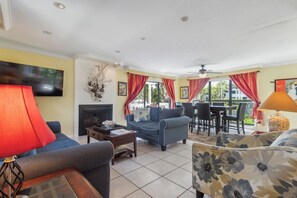 TV, fireplace - Anthony Beach Cottages - 49 Sunset Captiva (Captiva)