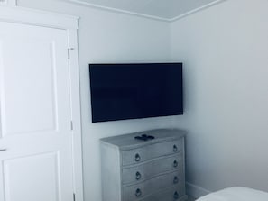 first floor bedroom with 2 queen beds