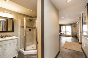 Combined shower/bathtub, hair dryer, soap, shampoo - “Mountain Escape-7BR, Game Room, Fire Pit Close to Skiing and Trails!” (Lake Harmony)