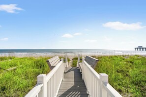 A wooden boardwalk leading to a beach with a clear sky. - 'SUNSWEPT' OCEANFRONT  PRIVATE POOL + BEACH WALK, SLEEPS 16, EXCEEDS EXPECTATION (Surfside Beach)